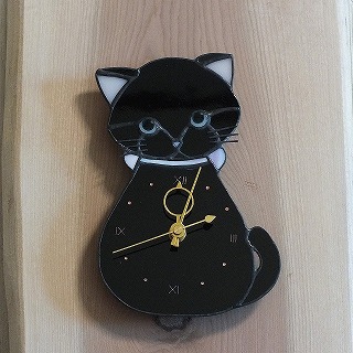 猫の時計・黒猫